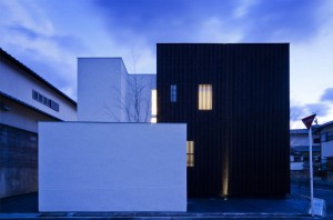 HOUSE WITH A LOUVER TOWER: Facade (Evening)